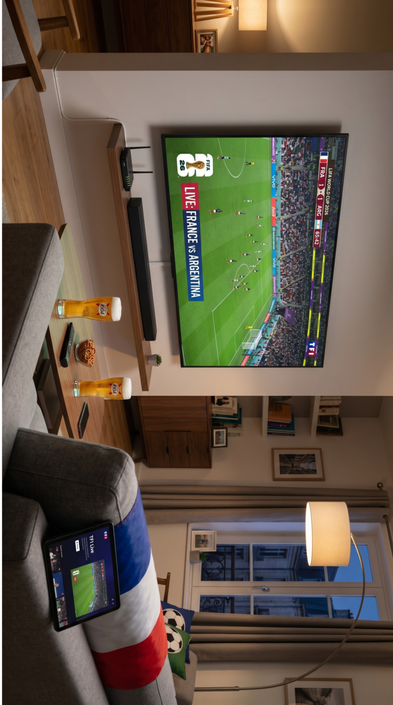 Salon préparé avec TV 4K murale, barre de son et box Ethernet pour regarder la Coupe du Monde 2026